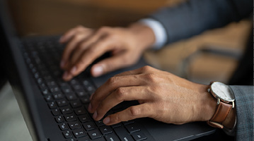 hands on a keyboard